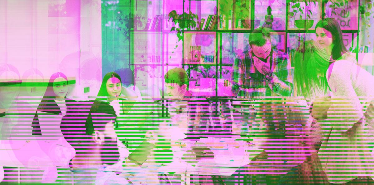 People sitting around work table with multi-color filter