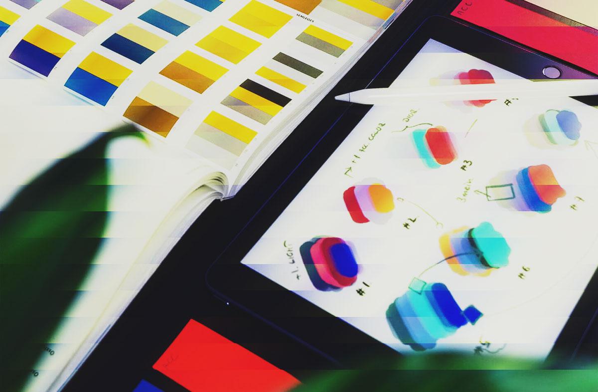Color palettes and design tablet sitting on desk