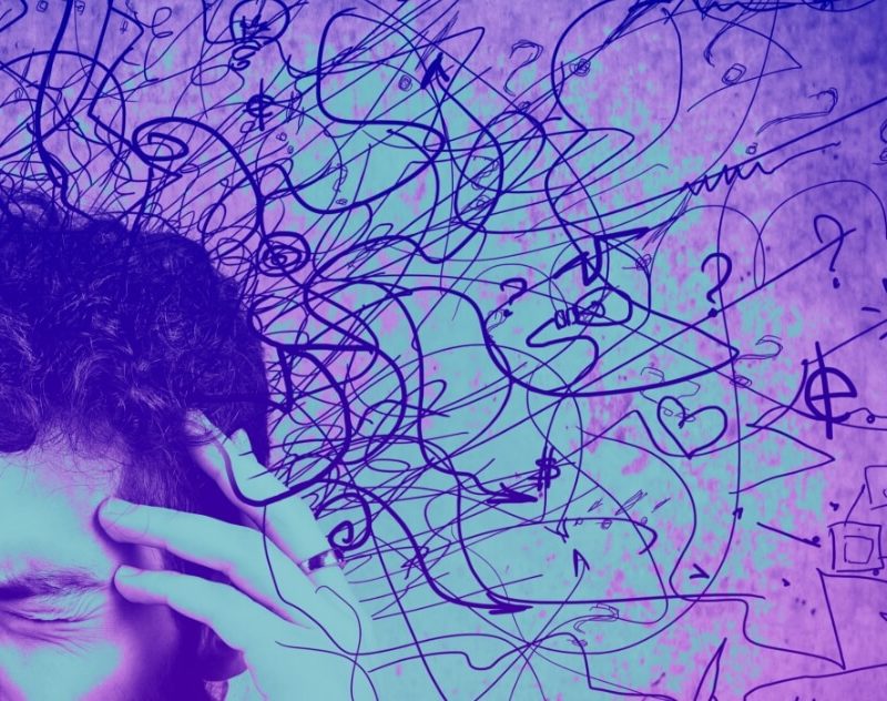 Vibrant stylized image in magenta and cyan. A man holds his hands up to his head in frustration as hand illustrated squiggle lines emanate up from his hair.