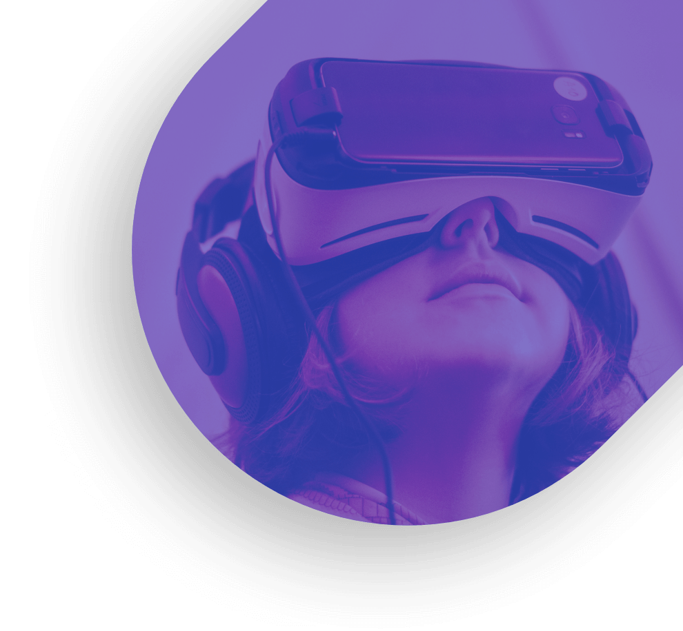 Woman wearing VR goggles with purple background