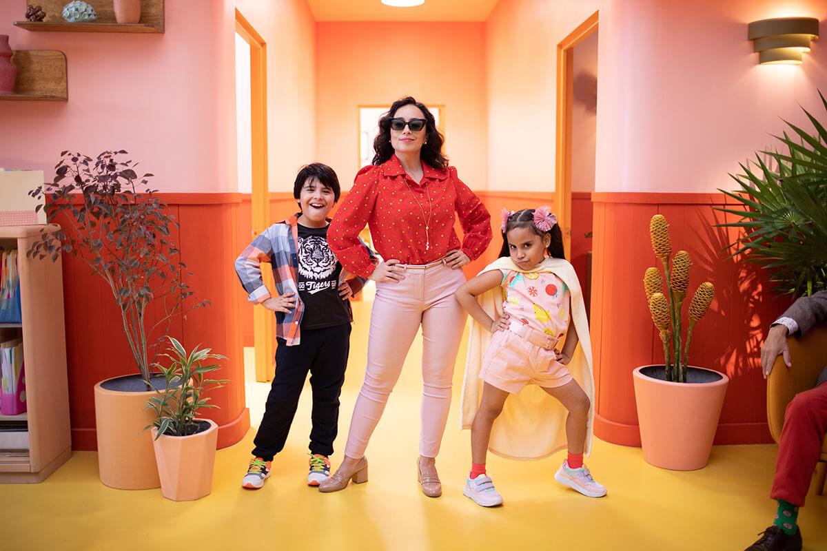 Family posing in colorful office