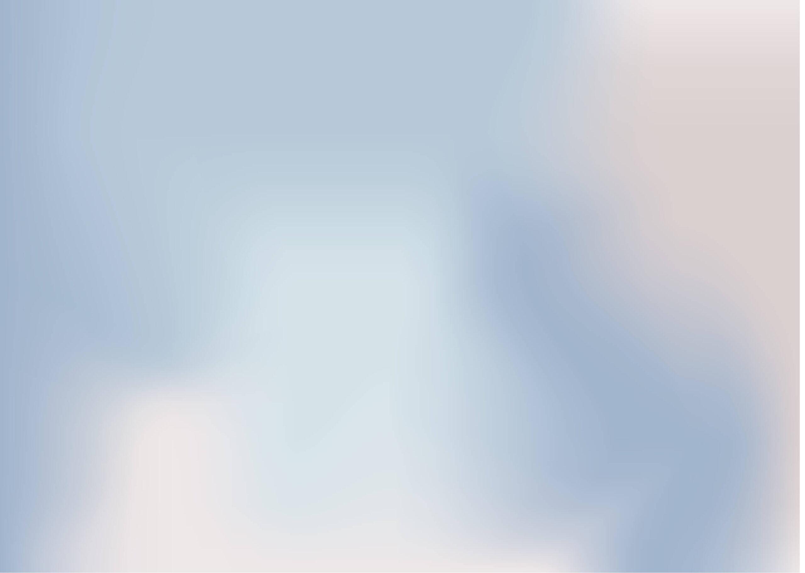 A soft, blurry abstract background featuring light blue and beige tones blending seamlessly together.