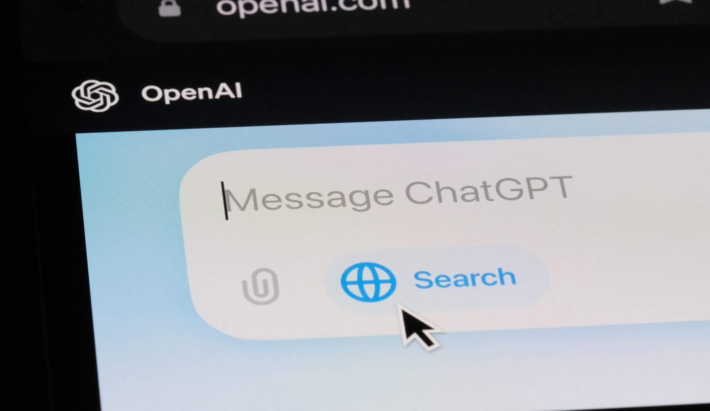 A computer screen displays the OpenAI logo and a chat interface with the text Message ChatGPT. A cursor hovers over a blue Search button with a globe icon, highlighting tools for employing Gen Z in modern digital workspaces.